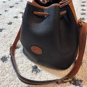 Dooney & Burke Drawstring Black and Brown Leather Bucket Bag